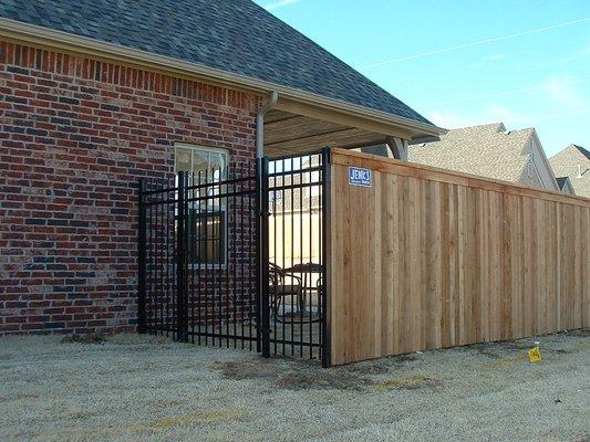 Iron Gate with 6ft Cedar Privacy Fence with Cap and Trim