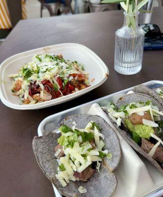 Chicken Cabo bowl and Tri Tip Tacos (we requested no sauce on the tacos and they were accomodating)