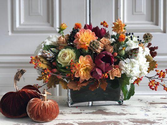 A sophisticated fall arrangement of bountiful blooms for your Thanksgiving table!