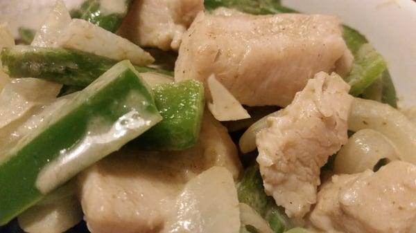 Chicken and veggies in green curry sauce