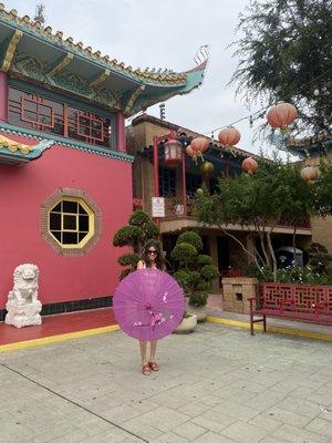 Umbrella and the surrounding area outside the store.