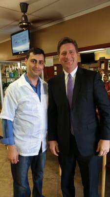 Owner of Central Barber Shop Roman N. with Mayor of Phoenix Greg Stanton