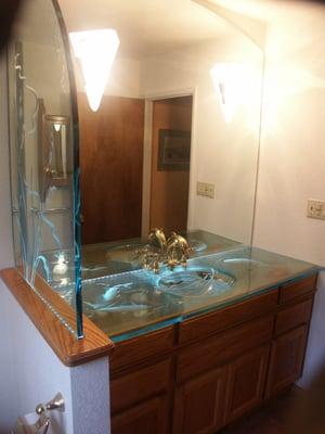 Glass counter top with slumped sink, etched trout and LED lighting