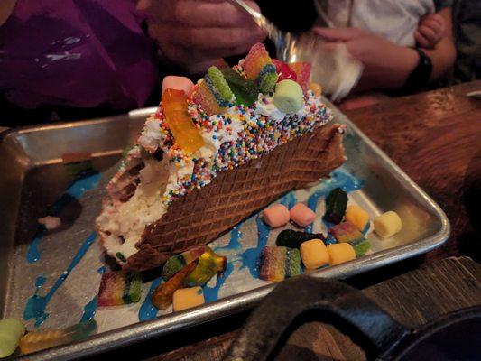 Unicorn Dreams Dessert Taco - yummy except for the hardened rainbow pieces