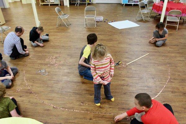 Students creating a giant circle on Pi Day (3.14)