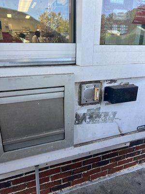 The drive through window is in desperate need of repair and clean up -