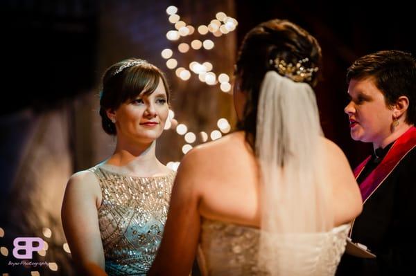 Rev. Sarah presiding over a wedding in New York.