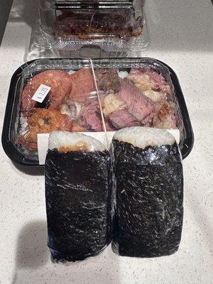 Bento box and spam musubi - early bird catches the worm.. perfect food for the flight home