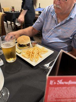 One of three very overcooked $19.00 burgers