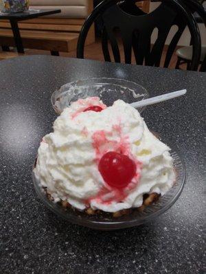 Delicious one scoop sundae, chocolate macaron ice cream with hot fudge sauce and lots of whipped cream! Under $2.50