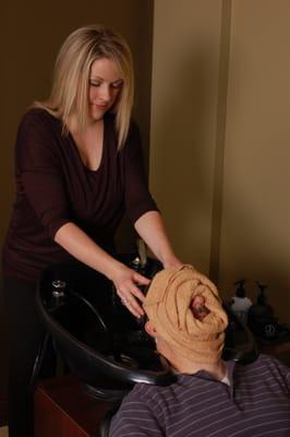 Hot towel and scalp massage are a part of the Fritz's Haircut service.