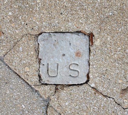 Historical marker on the street/walkway near Cathedral Pl