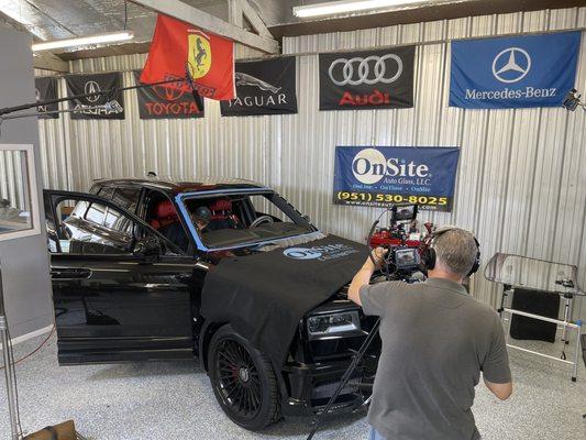 Shooting tutorial video on how to properly replace a windshield on a Rolls Royce Cullinan