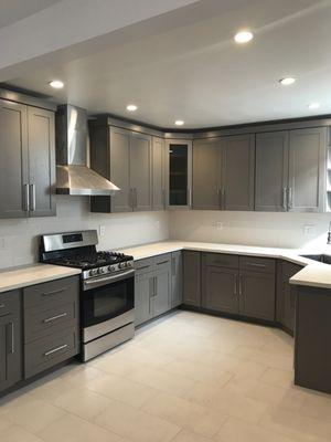 The open floor plan features ample amount of cabinets for storage.