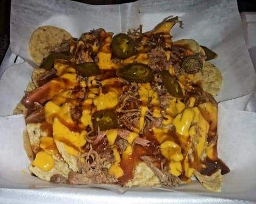 THIS IS OUR FAMOUS BBQ NACHOS.