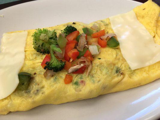 Veggie omelet (comes with home fries and toast, not pictured)