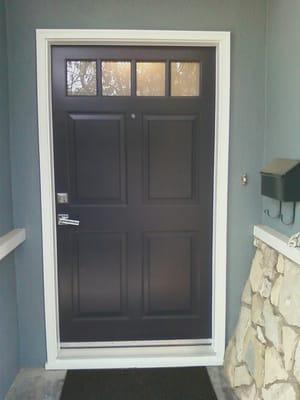 Beautiful four lite 42" wood door. Custom spray painted with chrome hardware.