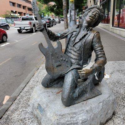 A picture of the famous Jimi Hendrix statue in Capitol Hill neighborhood in Seattle.