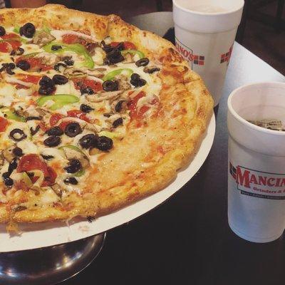 Large Mancino 's Super Pizza