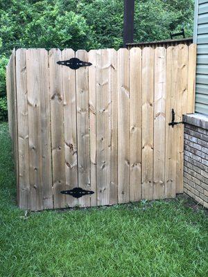 Notice the panels aren't flush, the string is still on the fence, and the hinges are sagging.