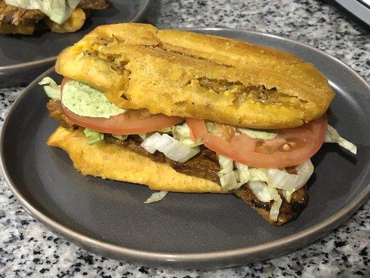 Steak Jibarito with lettuce, tomato and cilantro garlic mayo