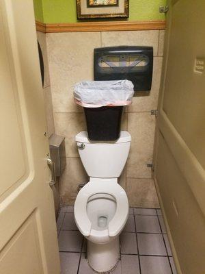 Trash on top of toilet so you can smell everyone's toilet paper scent ...