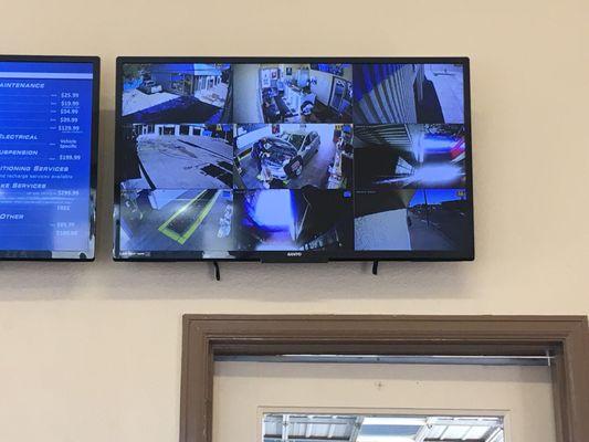 Watch them while they work on your car. They have actual TV to watch too, but how cool!