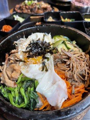 Bibimbap in a hot stone pot.