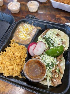 Carnitas street tacos, rice and beans