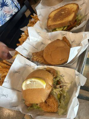 Shrimp poboy, kids chicken sandwich and Nashville style fish sandwich.