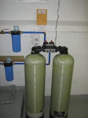 Arsenic removal systems installed treating your drinking water and making it safe for you and your family