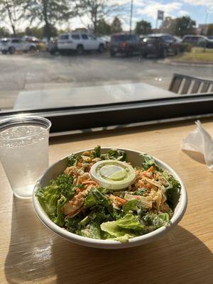 Buffalo caesar salad (added rice, kale, romaine, carrots, Parmesan, buffalo chicken, and Caesar dressing)