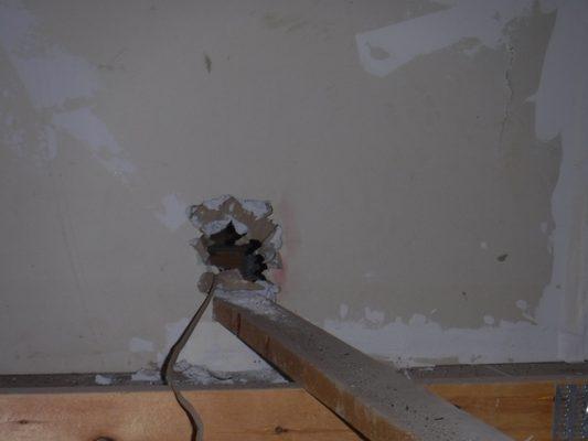 Hole in firewall in attic