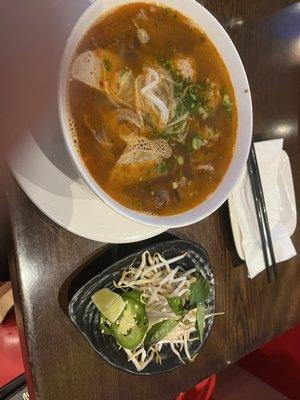 Bun Bo Hue - I eat spicy all the time so keep that in mind. For me it was mild spicy and very flavorful, I felt energized after eating