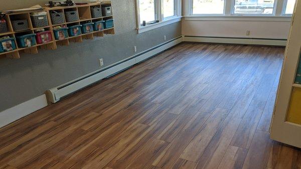 Finished new vinyl plank flooring before trim.