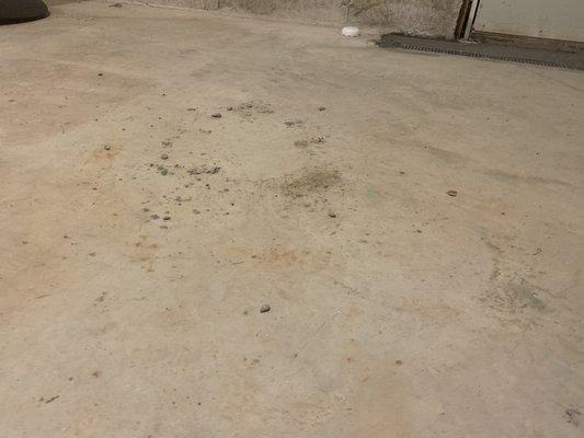 Chunks of cement left all over floor