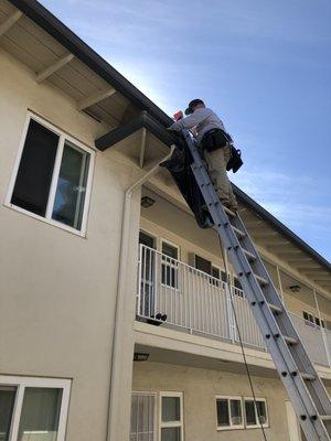 Installing a two story downspout