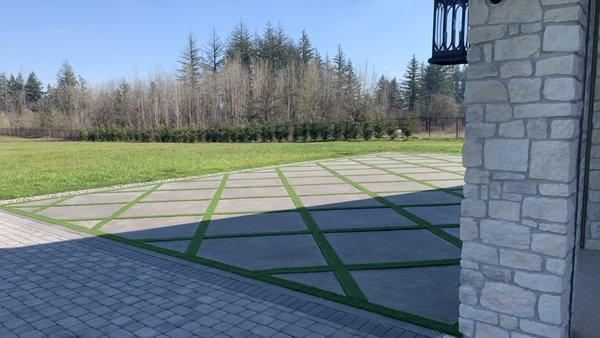 Pavers and concrete slabs with turf