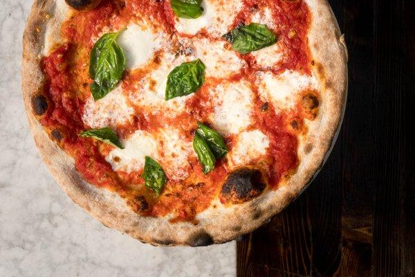 Margherita Pizza with tomato, fresh mozzarella, and basil.