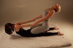 Cobra pose. Thai Yoga Massage. A massage style we teach & students practice at the student clinic.