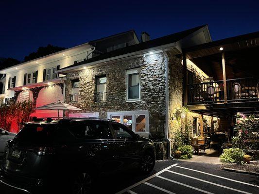 An outside shot of the pub on the ground floor and the patio and upstairs dining