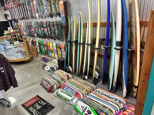 The Quiver of surf boards for sale and a ton of skate decks...