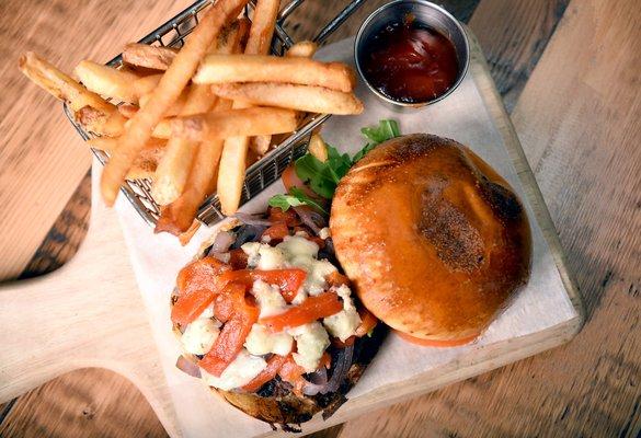 Crosta Burger with gorgonzola, caramelized onion, tomatoes, sweet-hot pickles and truffle fries