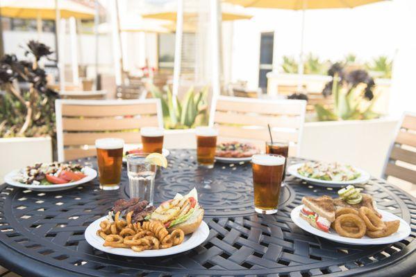 Enjoy delicious burgers, sandwiches, pizza, salads, and a full bar at Coasters Bar & Grill, inside the Boardwalk Bowl in Santa Cruz