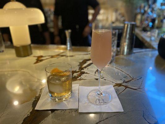 Cocktail with mezcal and chocolate bitters (left) and the French 75 variation (right).