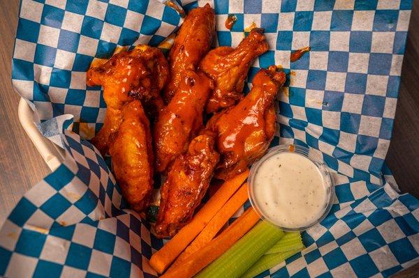 Chicken Wings - choice of Buffalo or Spicy BBQ sauce with carrots and celery