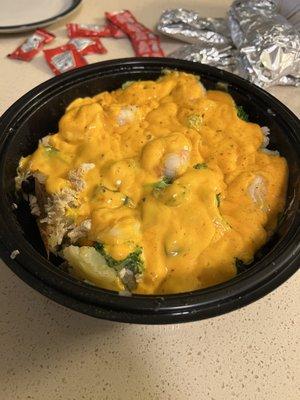 Baked potato regular butter, chicken, shrimp, veggies, nacho cheese