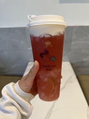 Peach tea with milk cheese foam and Crystal boba