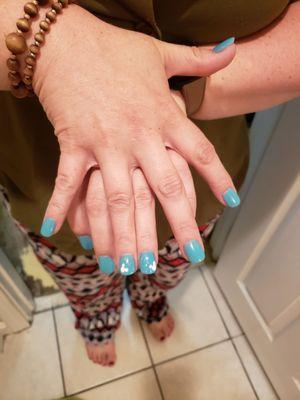 different lengths in nails. woman argued with me about the color and told me I wasn't getting a design after she screwed it up.