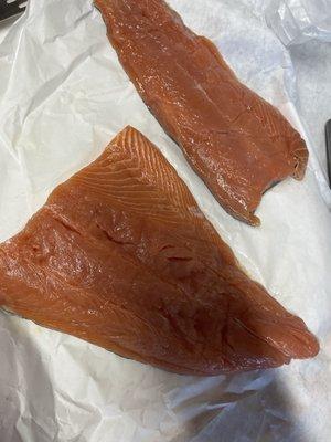 Big slab of salmons that ended up being more than the pound that requested and she won't cut it into filets